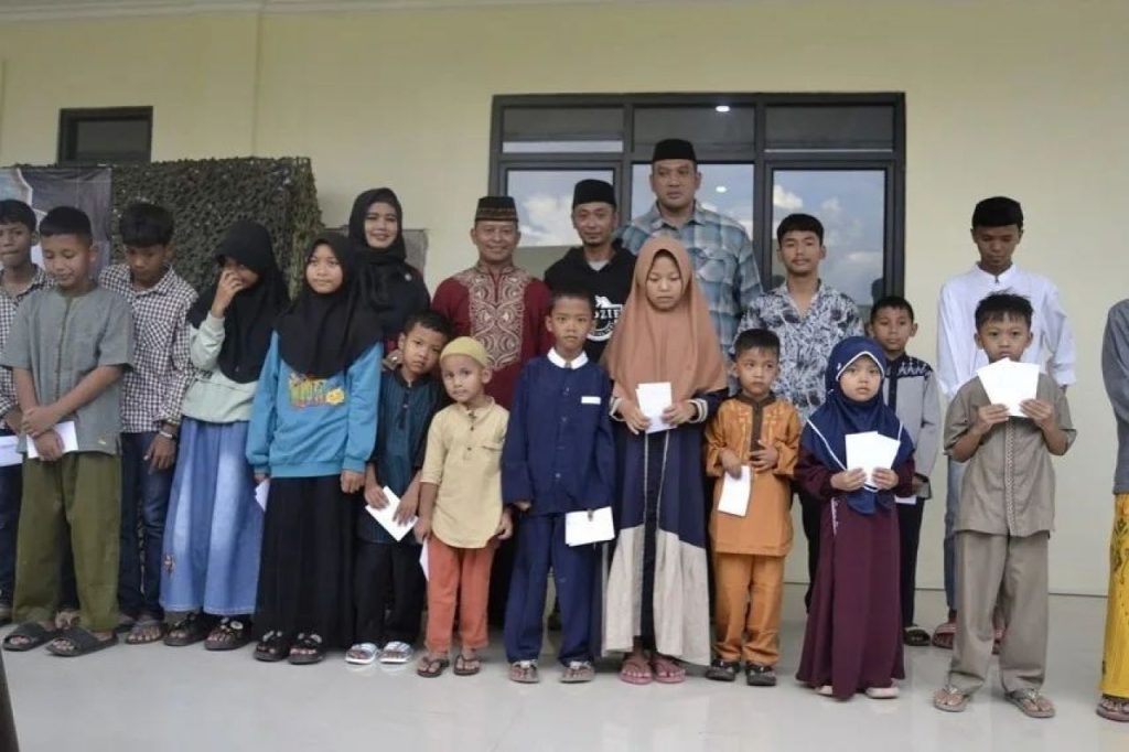 Ladang Pahala Santuni Anak Yatim, Yonarmed 13 Kostrad Berbagi Kasih Untuk Sesama