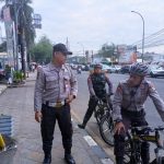 Patroli Polisi Bersepeda Beri Imbauan Antisipasi Kejahatan Pecah Kaca di Rest Area Pinang
