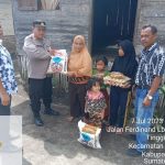 Kapolsek Laguboti Berikan Tali Asih Kepada Warga Desa Lbn Bagasan