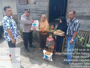 Kapolsek Laguboti Berikan Tali Asih Kepada Warga Desa Lbn Bagasan