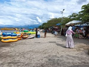 Hari Pertama Libur Natal 2023, Polres Toba Siaga Patroli dan Tingkatkan Pengamanan Di Obyek Wisata Pantai