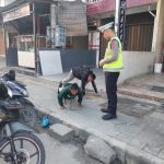 Polres Toba Bersama Dishub Toba Melakukan Pengaturan Lalu Lintas