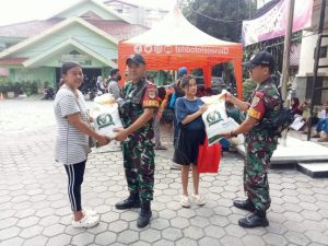 Babinsa Koramil 02/Sawah Besar Monitoring Penyaluran Bantuan Beras Bulog