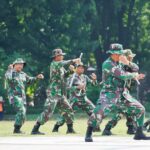 Aksi Ratusan Babinsa Kodim 0813 Jelang Perayaan Puncak HUT TNI ke- 79 di Alun-alun Bojonegoro