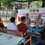 Ngopi Kamtibmas, Polsek Cipayung Ajak Warga Jaga Kondusifitas Jelang Pilkada