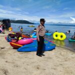 Patroli Ke Tempat Wisata Pantai, Polsek Balige Imbau Pengunjung Utamakan Keselamatan