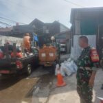 Karya Bakti Koramil 05/Kramatjati Normalisasi Saluran Air
