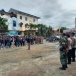 Polres Toba Hadiri Apel Siaga Pengawasan dan Penertiban APK Pilkada