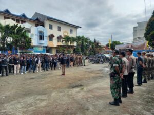 Polres Toba Hadiri Apel Siaga Pengawasan dan Penertiban APK Pilkada