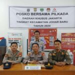 Pengamanan Gudang Logistik KPU oleh Polsek Johar Baru, Satpol PP, dan Dishub Jelang Pemungutan Suara