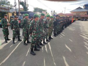 Kodim 1710/Mimika Bersama Polres Mimika Laksanakan Apel Gelar Pasukan Pengamanan Tahun Baru 2025