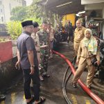 Wadanramil 05/TA Sigap Tinjau Genangan Air Akibat Luapan Kali Krukut di Karet Tengsin