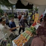 Rela Antri Sejak Pagi, Ribuan Masyarakat Serbu Bazar Murah Kolaborasi Pemkot Kediri dan KPw BI Kediri