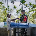 Satgas TMMD Kodim 1710/Mimika Berikan Bantuan Kolam dan Bibit Lele