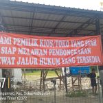 Spanduk Merah di Tuban: Warga Siap Gugat Hukum Pemdes Soal Penggusuran Kios