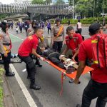 Patroli Dit Samapta Polda Metro Jaya Tangani Kecelakaan Motor Saat CFD Jakarta