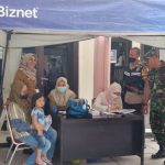 Dukung Pekan Imunisasi Nasional, Babinsa Jatimurni Lakukan Pendampingan Posyandu