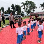 Polres Toba, Kasat lantas Iptu Nanang Kusmono Menerima Kunjungan Anak-Anak Dari TK Harapan Negeri Lumban Lintong