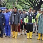 Gerakan Indonesia Asri Bekasi: TNI-Polri Bersihkan Danau Duta Harapan