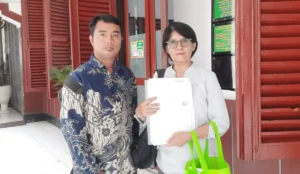 (Kiri) Muhammad Arfan.,S.H dan Tina Sudartini