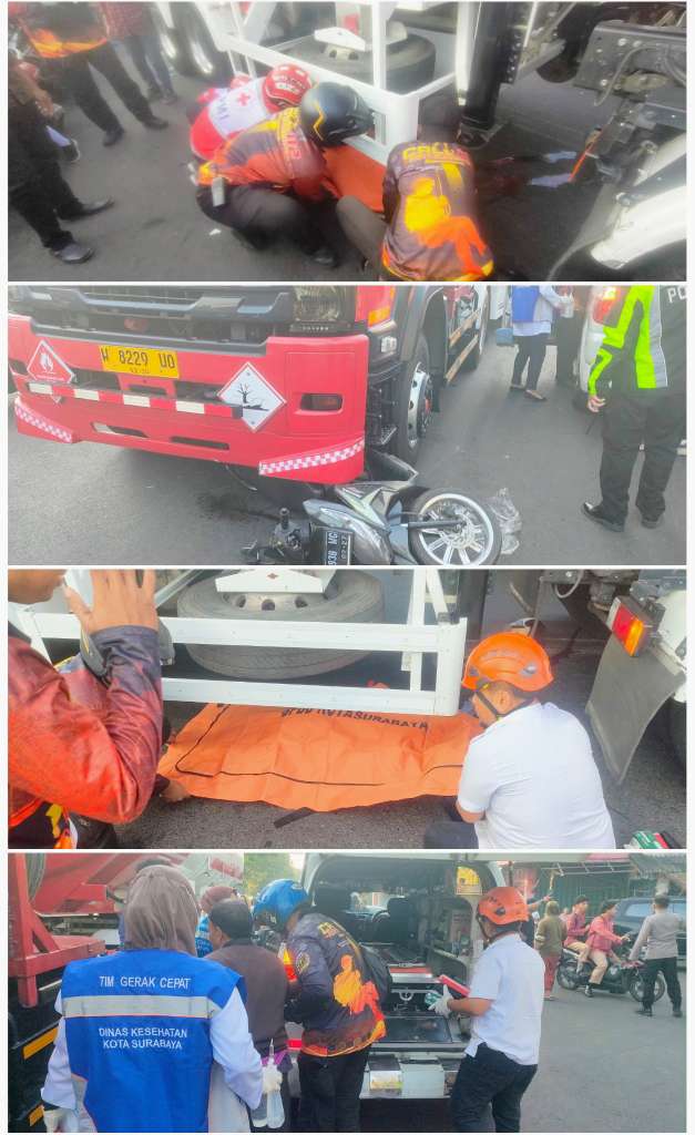 Foto: Petugas gabungan mengevakuasi korban kecelakaan lalu lintas yang melibatkan sepeda motor dan truk di Jalan Sultan Iskandar Muda, Kecamatan Semampir, Surabaya.